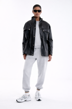 Black oversize leather jacket with patch pockets